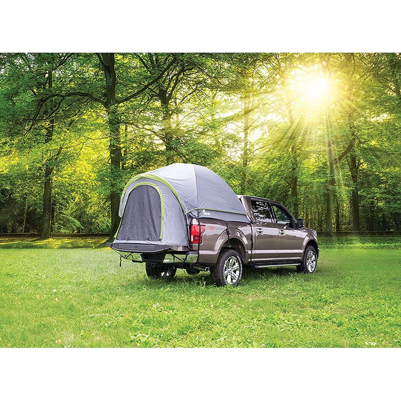 Truck bed tent with integrated floor set up on a pickup tailgate